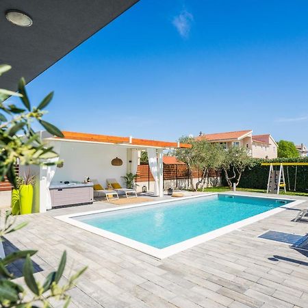 Villa Olea With Heated Pool And Jacuzzi Sukosan Bagian luar foto