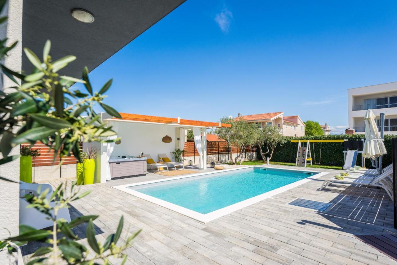 Villa Olea With Heated Pool And Jacuzzi Sukosan Bagian luar foto