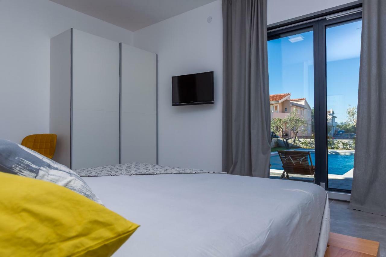Villa Olea With Heated Pool And Jacuzzi Sukosan Bagian luar foto